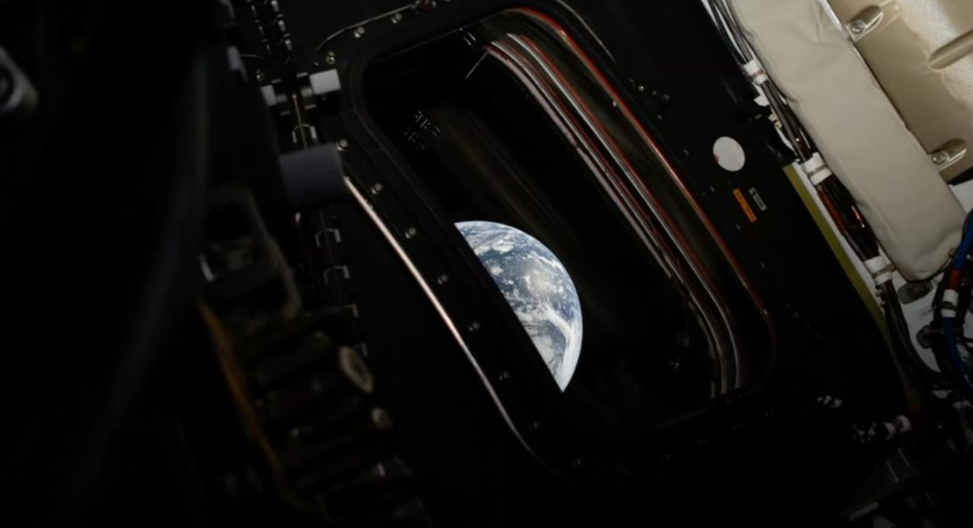 Parte da Terra vista pela janela da capsula Orion/Foto: Reid Wiseman