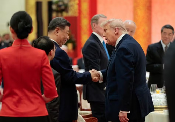 Xi e Trump se cumprimentam ap&oacute;s discursos/Foto: Ag&ecirc;ncia Reuters